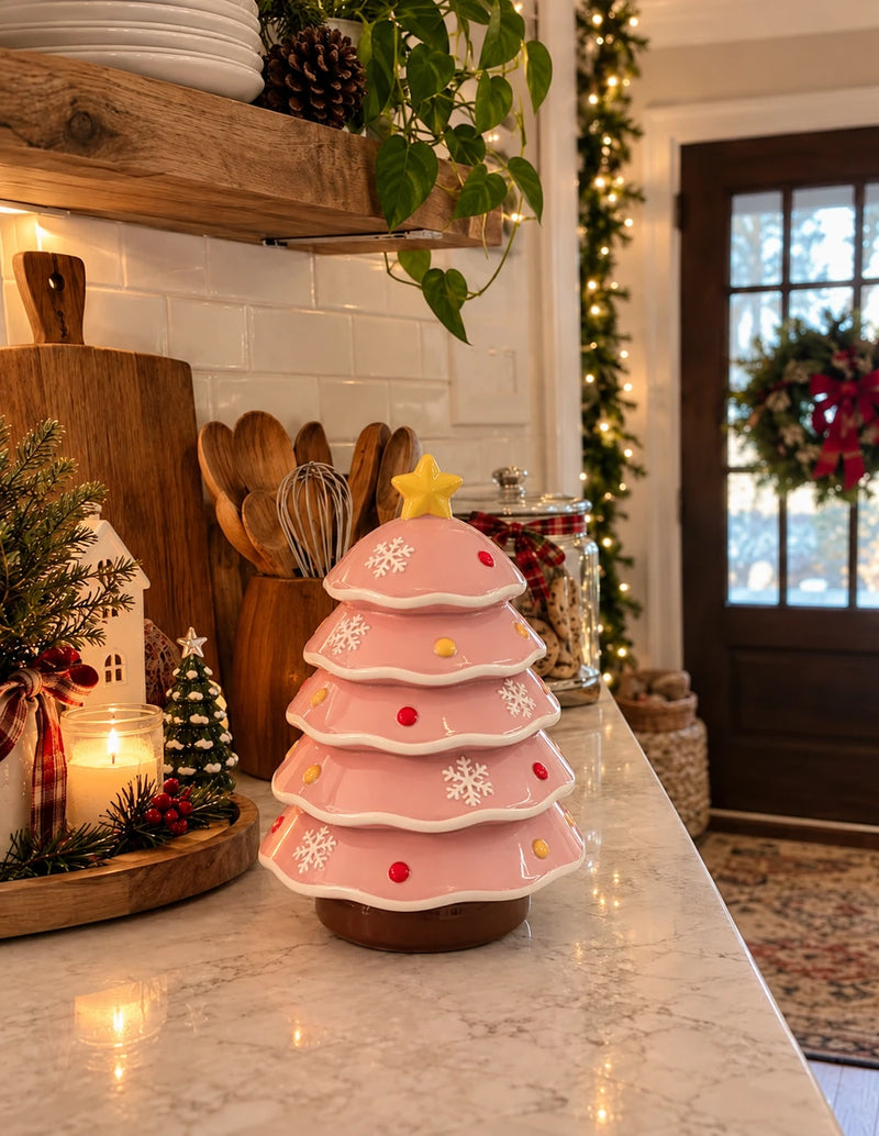 Pink ceramic Christmas tree centerpiece in a home setting